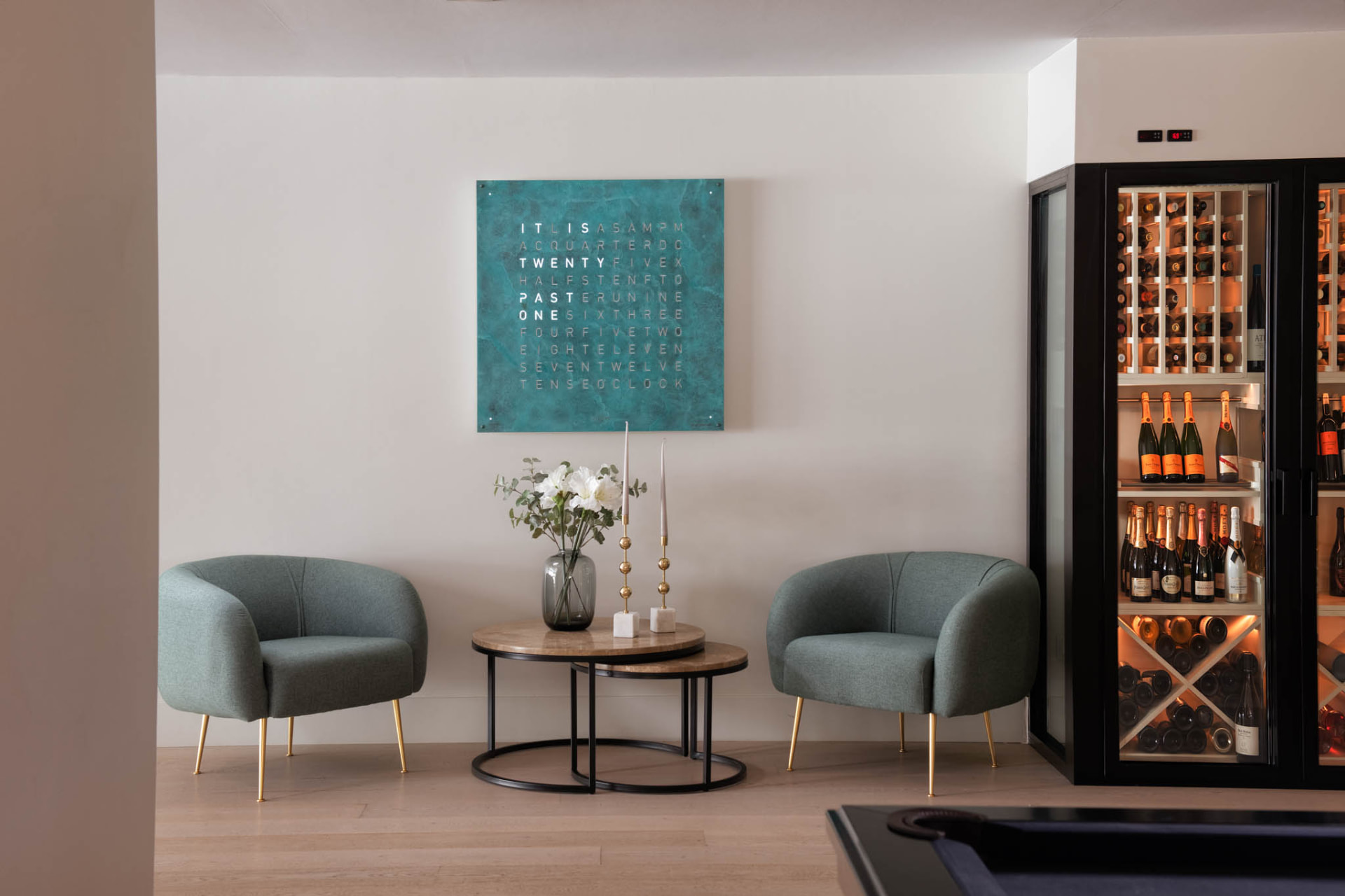 Wine refrigeration with a seating detail.